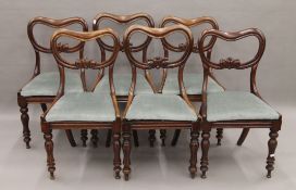 A harlequin set of six Victorian mahogany dining chairs. Each approximately 45 cm wide.