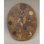 An oval wooden panel painted with a Jester and inscribed 'Xmas Greetings'. 31 cm high.