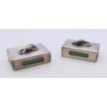 Two silver matchbox holders. 4 cm long.