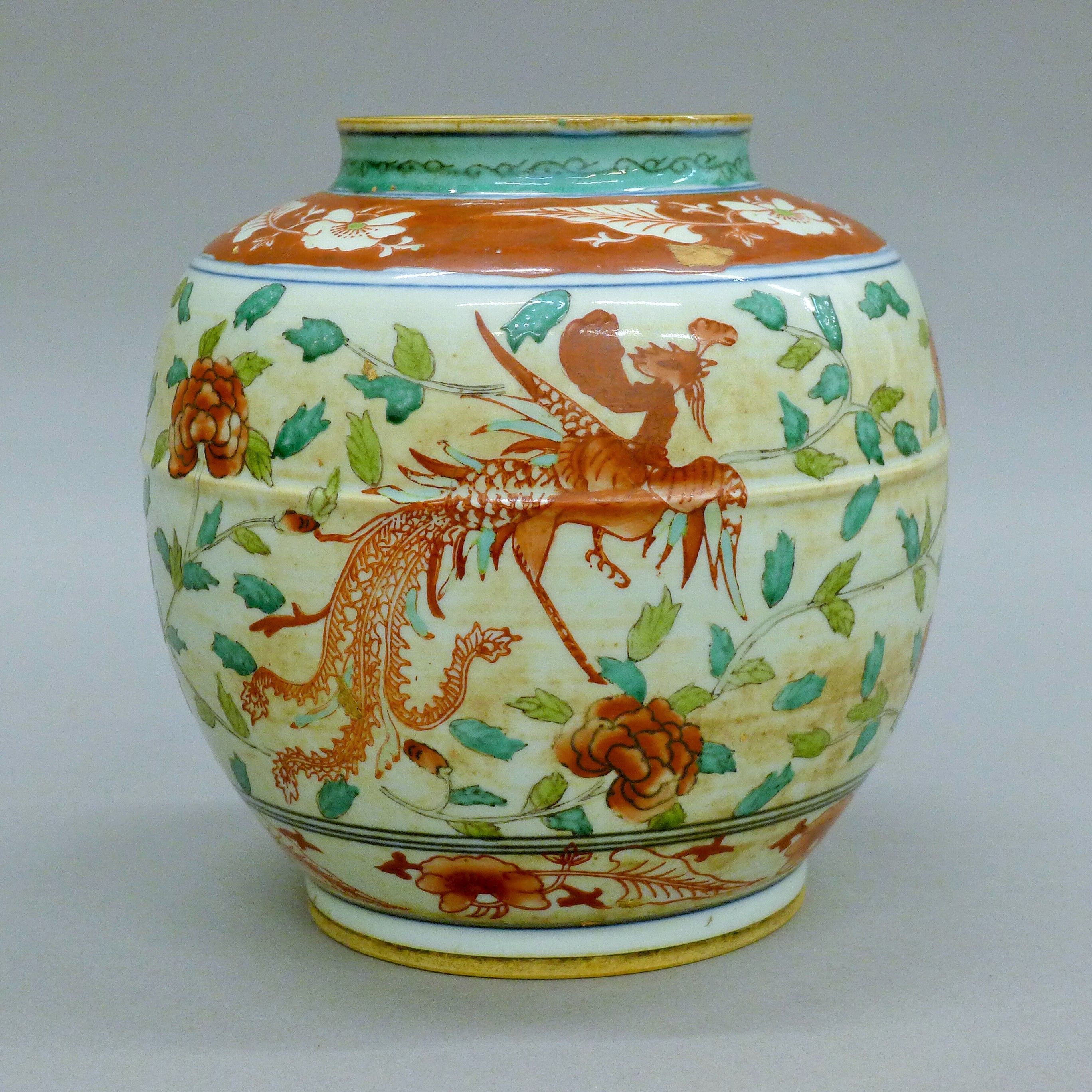 A 20th century Chinese Wucai enamelled ginger jar depicting a pair of phoenixes amongst a floral - Image 4 of 7