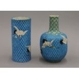 Two Japanese Meiji Period Satsuma vases, each decorated with cranes. The largest 24.5 cm high.