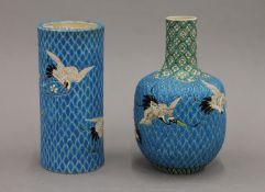 Two Japanese Meiji Period Satsuma vases, each decorated with cranes. The largest 24.5 cm high.