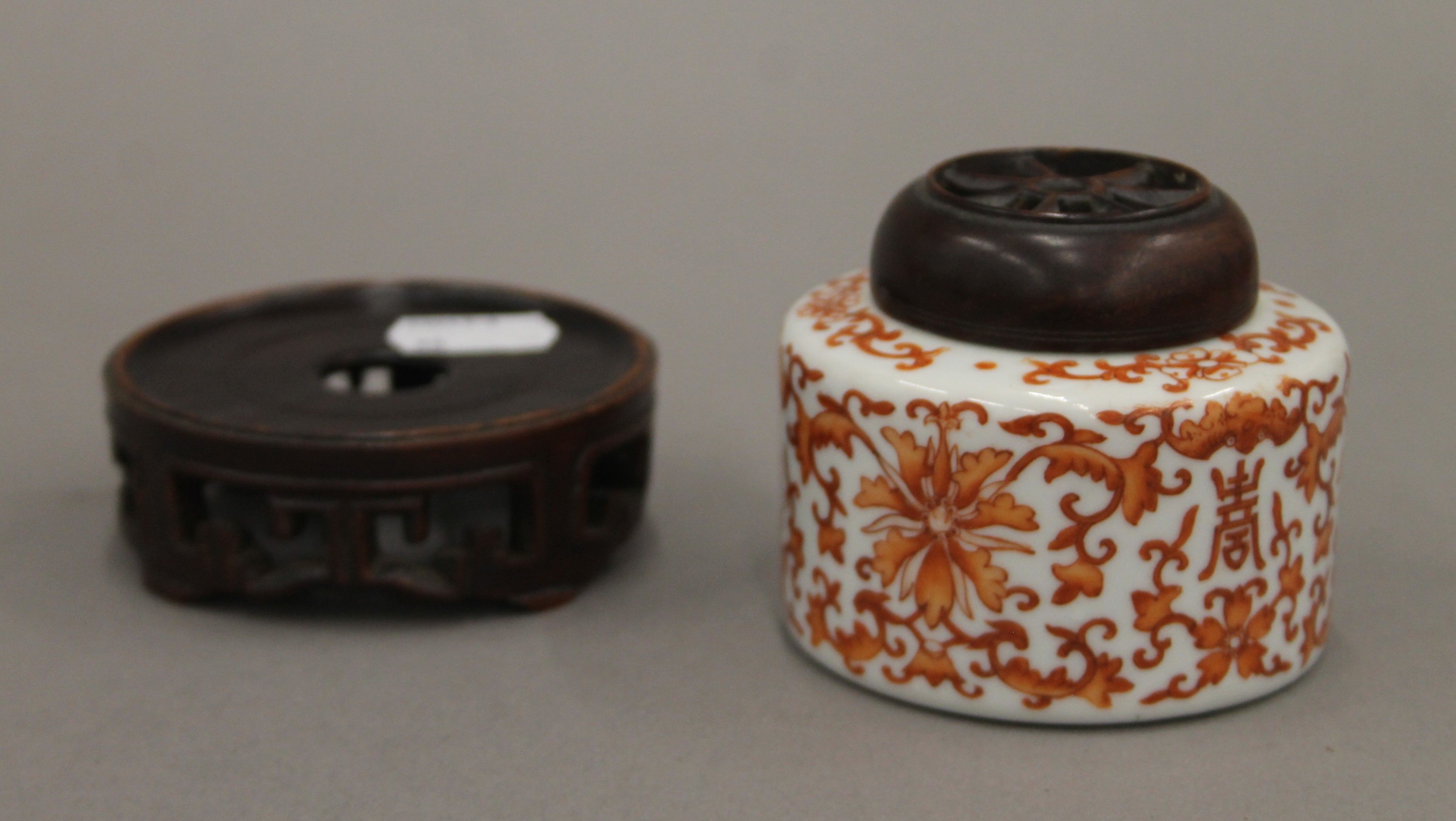 A Chinese porcelain jar with carved wooden lid and stand. 9 cm high overall. - Image 4 of 7