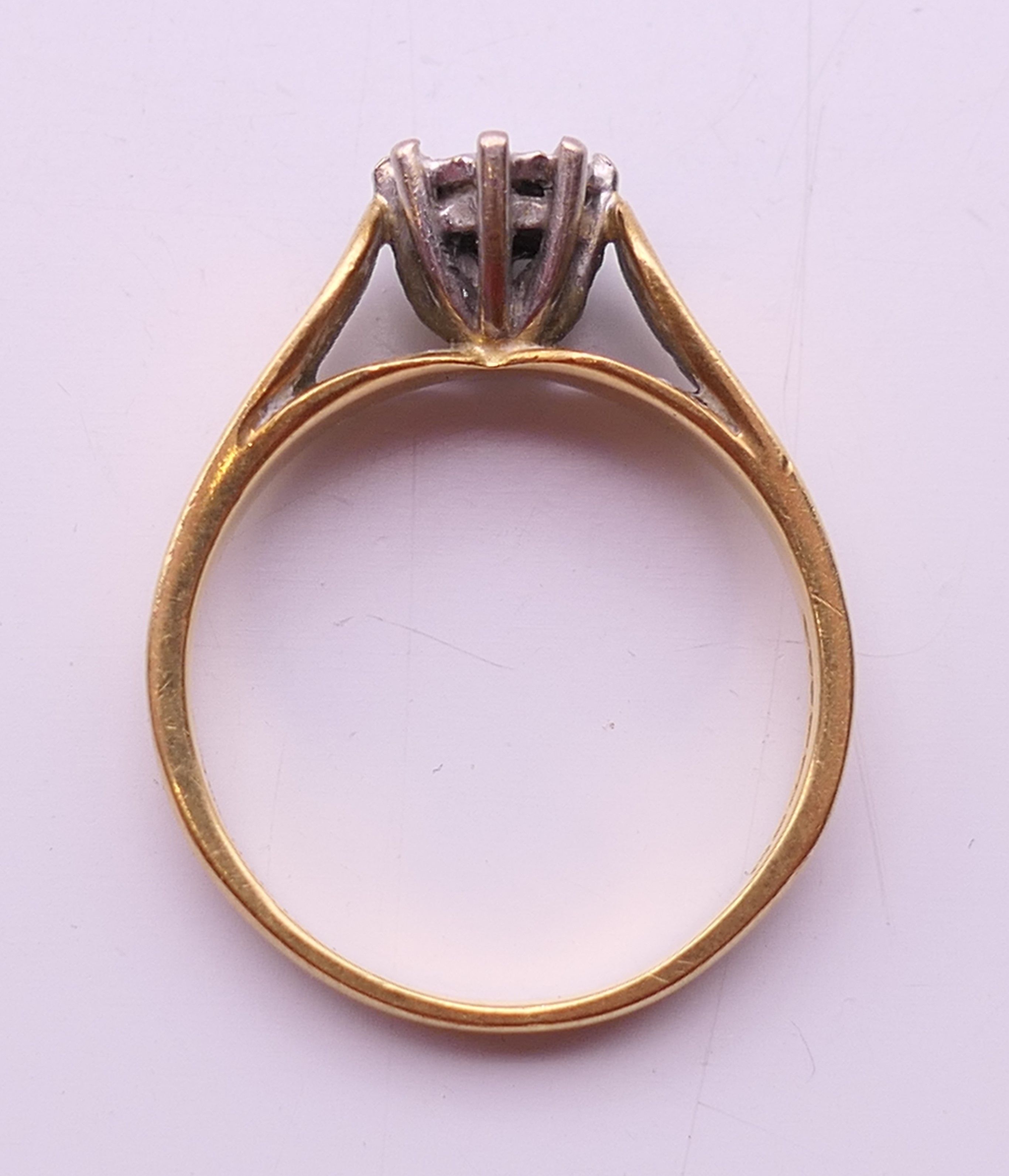 An 18 ct gold diamond solitaire ring. Ring size L/M. - Image 6 of 6