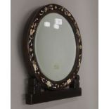 A Chinese mother-of-pearl inlaid strutt mirror. 38 cm high.