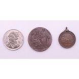 Three various medallions, including The Royal Life Saving Society. The largest 4.5 cm diameter.