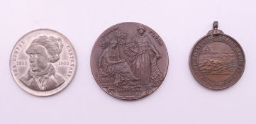 Three various medallions, including The Royal Life Saving Society. The largest 4.5 cm diameter.