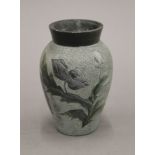 An Oriental carved hardstone vase. 13 cm high.