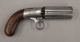 A 19th century pepper box pistol. 18.5 cm long.