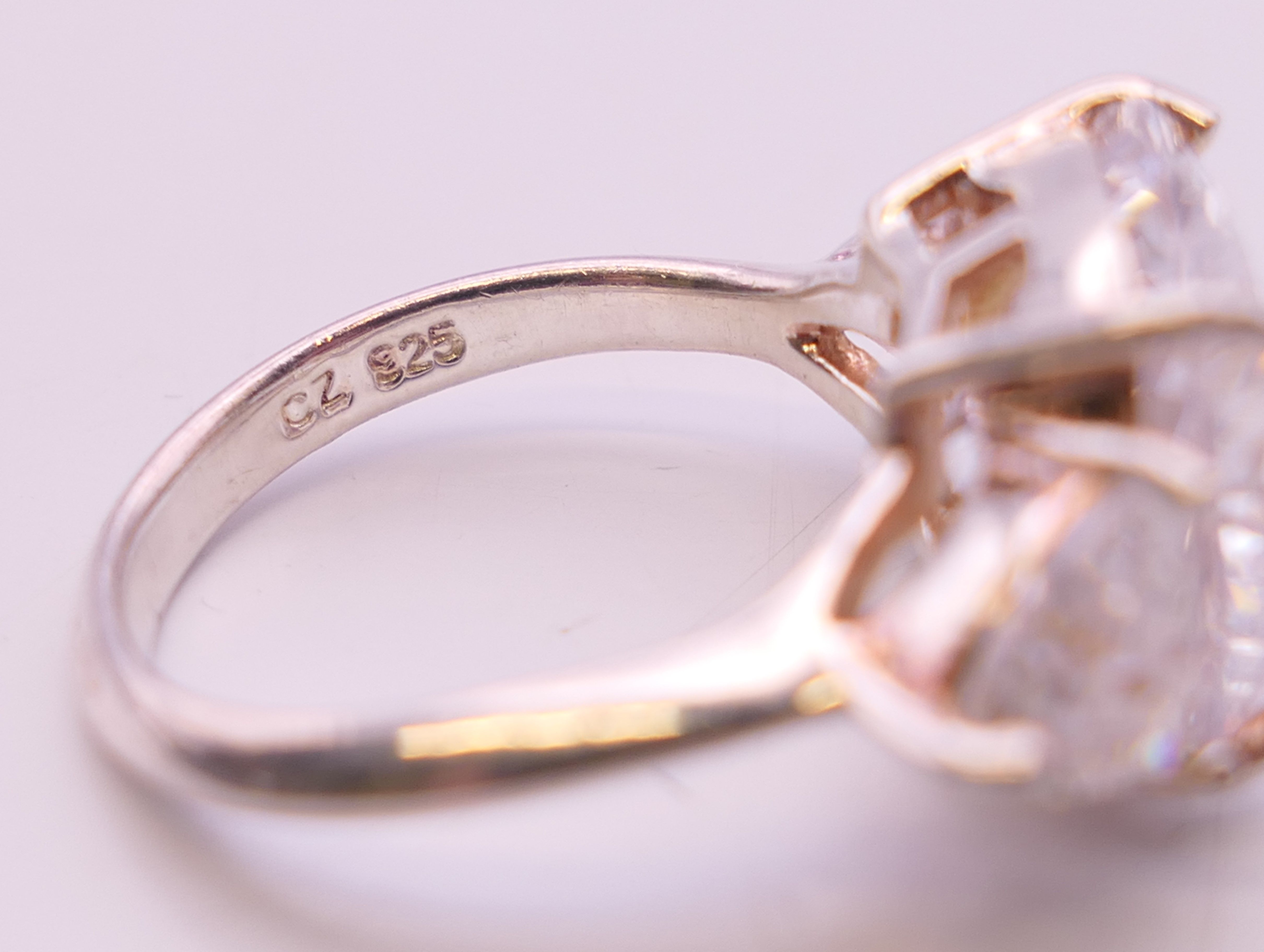 A silver cubic zirconia three stone ring. Ring size K/L. - Image 5 of 6