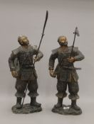 A pair of Japanese figures of warriors. The largest 68 cm high overall.