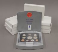 A quantity of Royal Mint boxed proof coin sets.