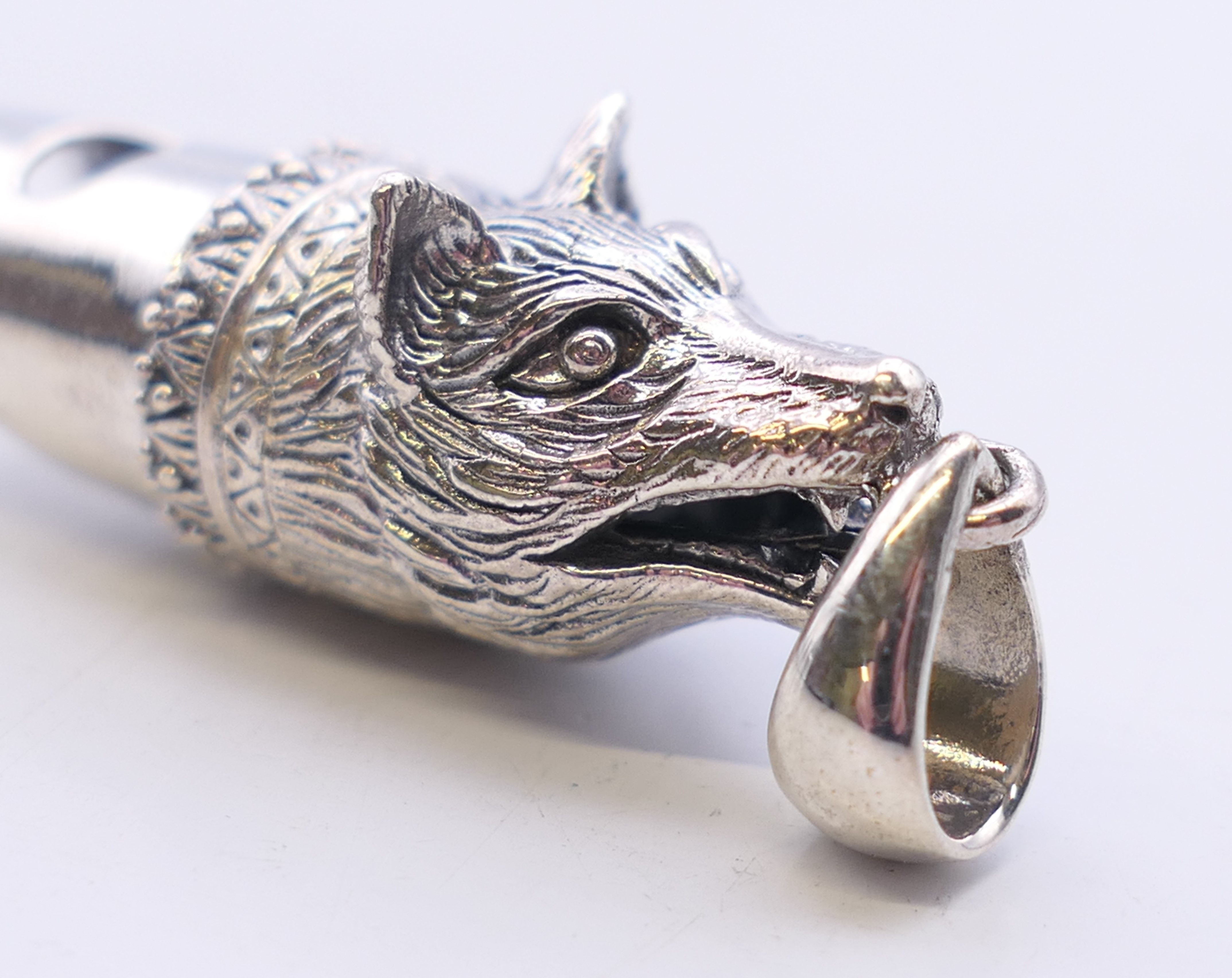 A silver fox mask whistle. 4.5 cm long overall. - Image 2 of 6