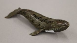 A Chinese bronze censer formed as a whale. 15.5 cm long.
