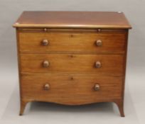 A 19th century mahogany chest of drawers with brushing slide. 95 cm wide.