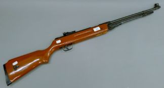 An under lever spring air rifle. 103 cm long.