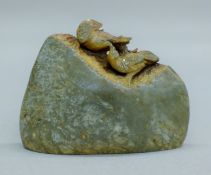 A Chinese hardstone seal carved with birds. 9 cm long.