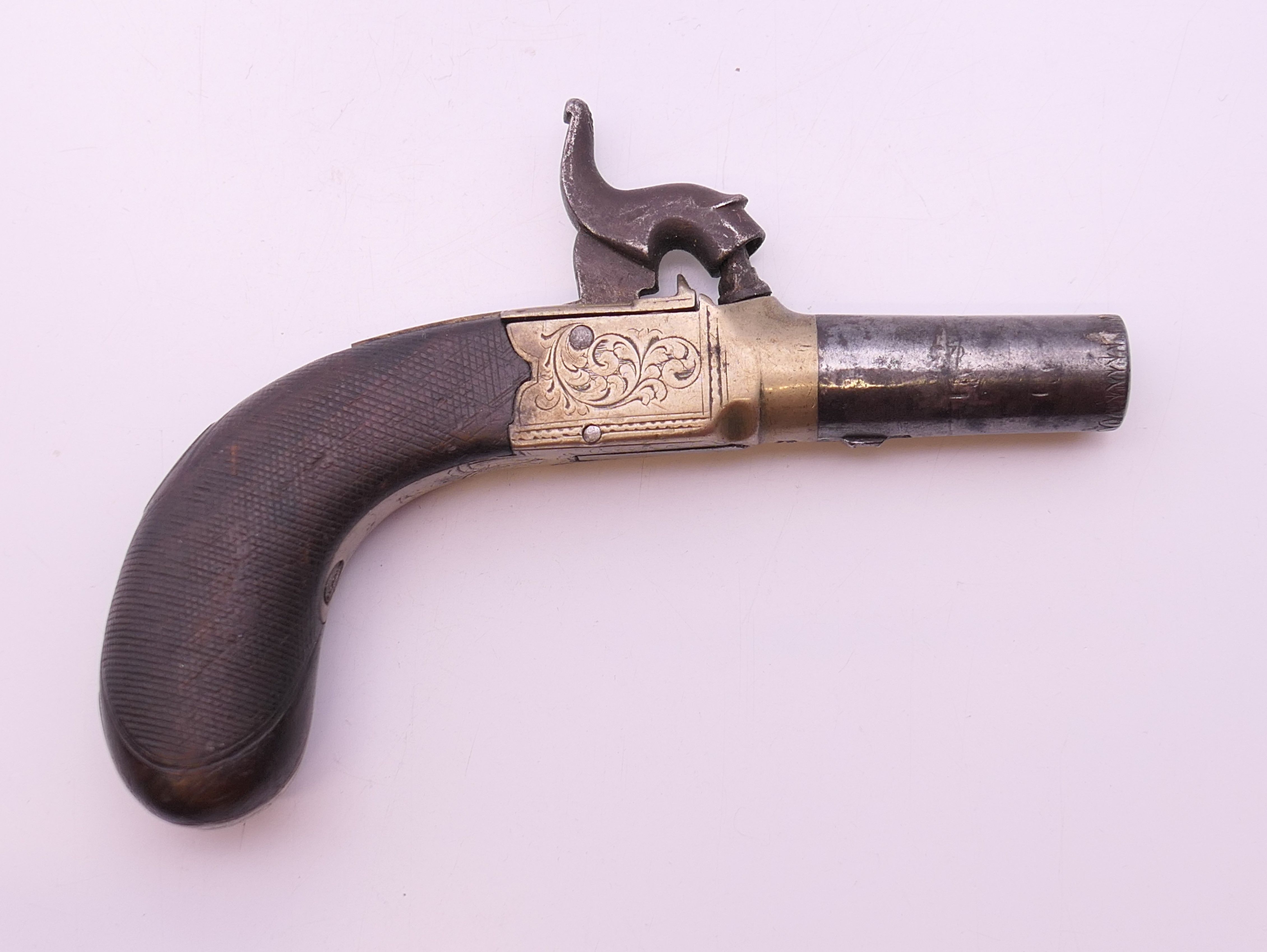 A 19th century pocket pistol, inscribed J Burrow, Preston. 12 cm long.