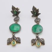 A pair of gold, diamond and chrysoprase drop earrings. 4.5 cm long.