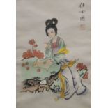 A Japanese Lady, fabric picture, framed and glazed. 24.5 x 34.5 cm.