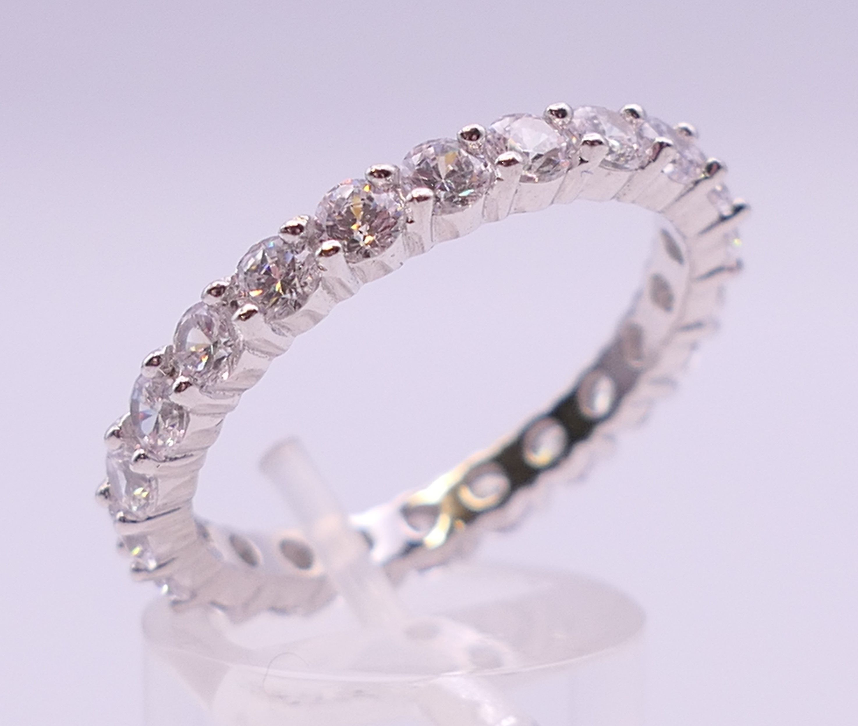 A silver and cubic zirconia full eternity ring. Ring size U. - Image 3 of 5
