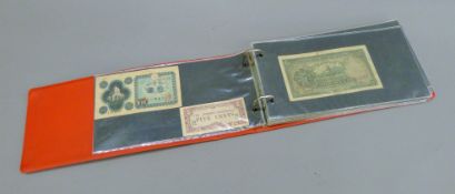 An album of foreign bank notes, including Chinese.