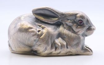 A silver model of a rabbit, bearing Russian marks. 6.5 cm long. 62.2 grammes total weight.