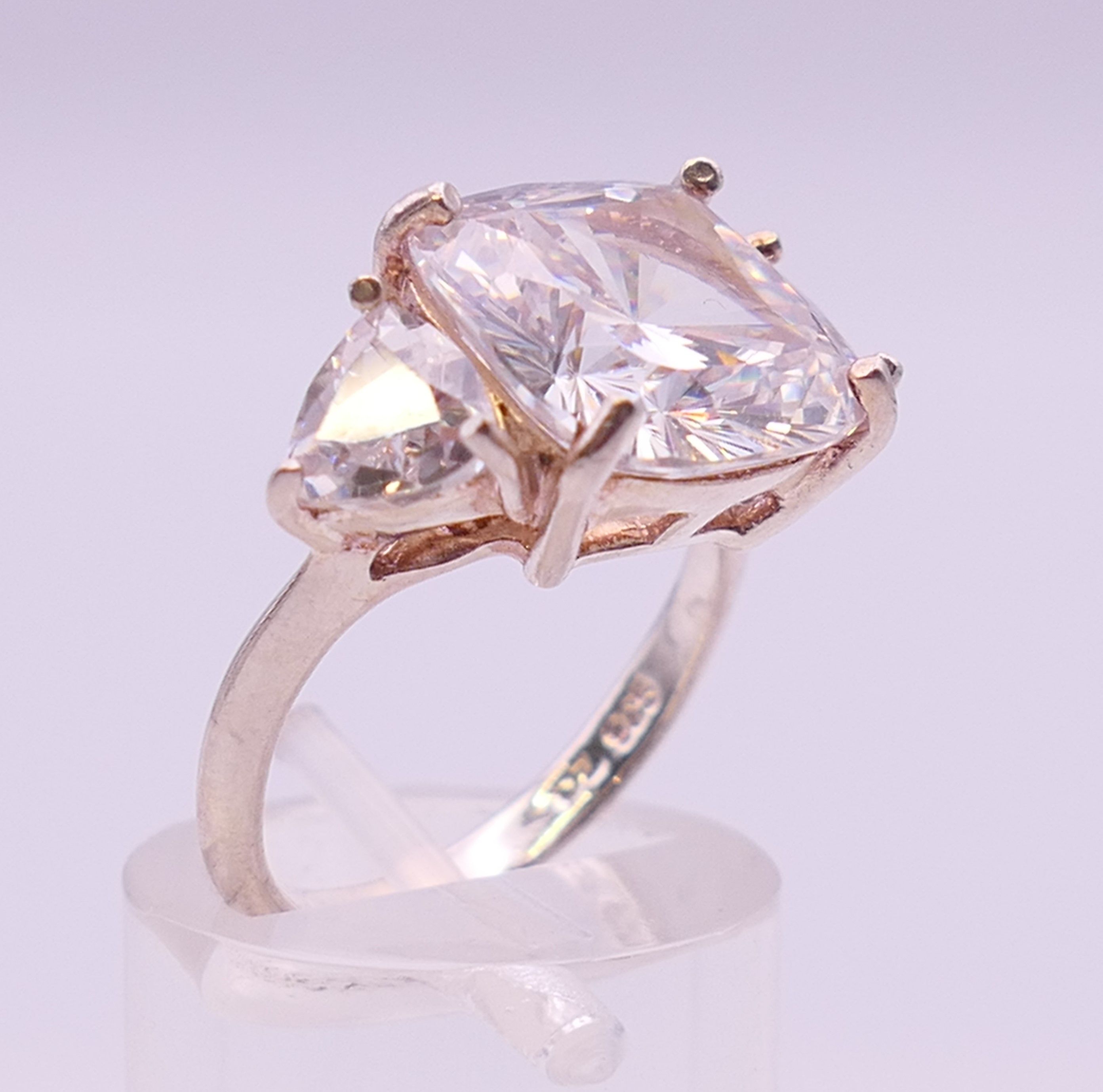 A silver cubic zirconia three stone ring. Ring size K/L. - Image 3 of 6