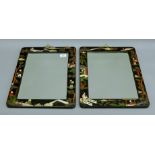 A pair of late 19th century Oriental lacquered hardstone bone and mother-of-pearl inlaid mirrors.