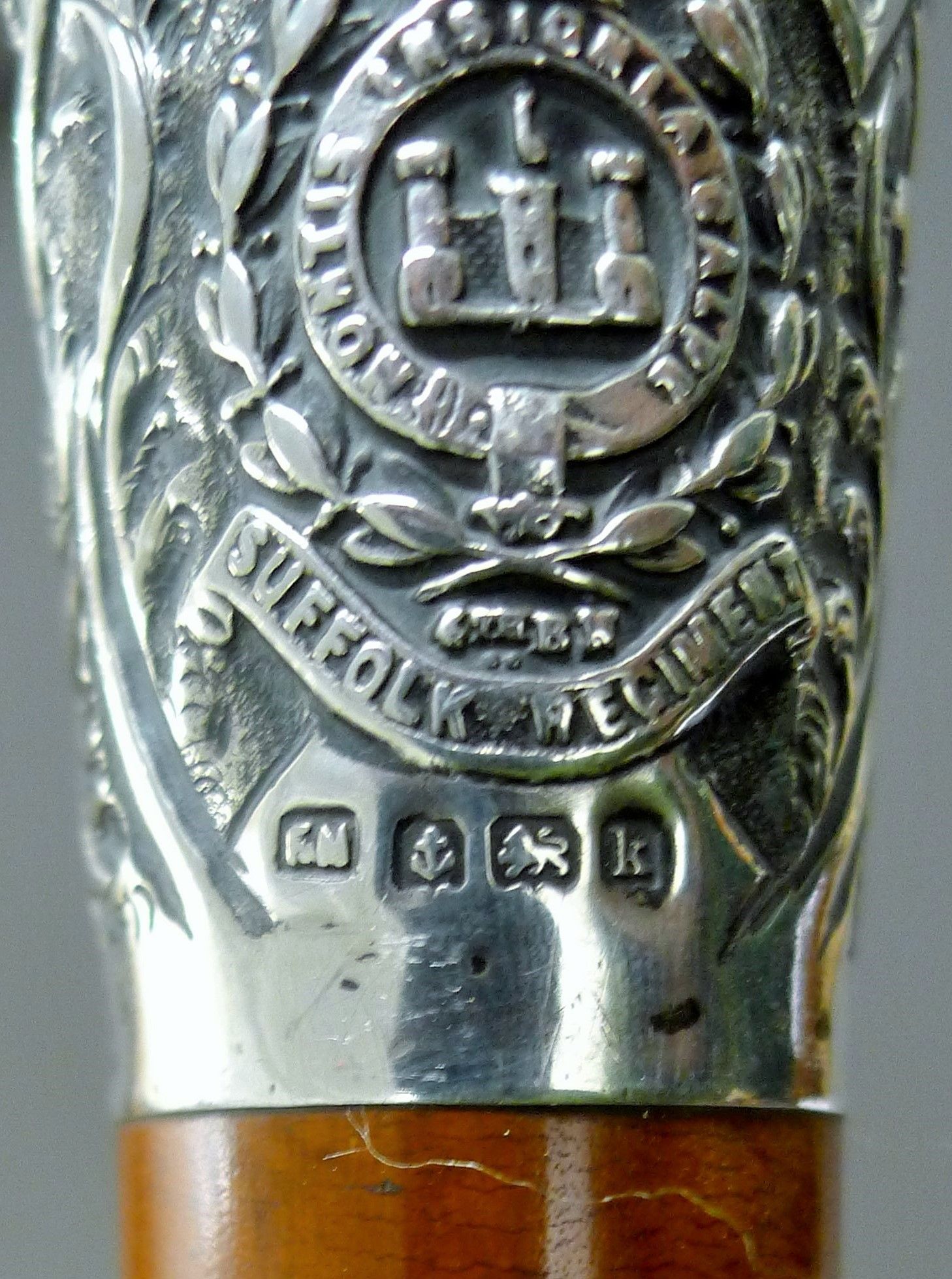 A silver mounted malacca cane decorated with Suffolk Regiment 4th Battalion insignia, - Image 4 of 4