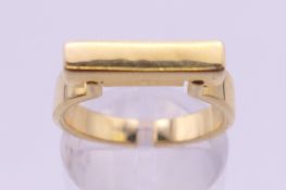 A silver gilt rectangular abstract ring. Ring size N/O.