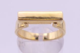 A silver gilt rectangular abstract ring. Ring size N/O.