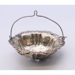 A sterling silver tea strainer. 7 cm diameter. 18 grammes.