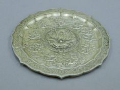 A Chinese white metal dish. 11.5 cm diameter.