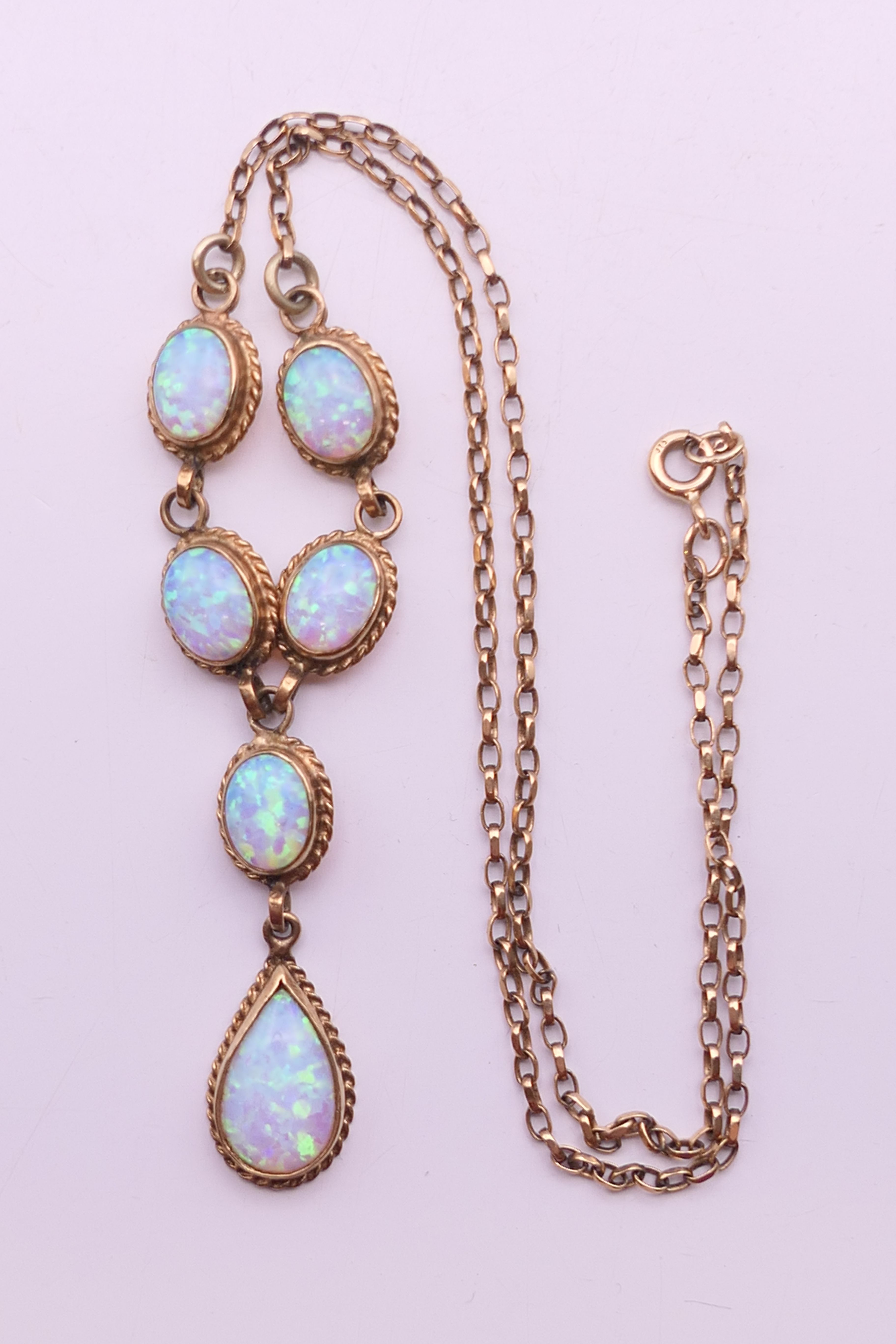 A 9 ct gold opal pendant necklace. 39 cm long. 7.2 grammes total weight. - Image 3 of 4