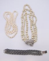 A Stellar & Dot designer pearl necklace, another pearl necklace and a bracelet.