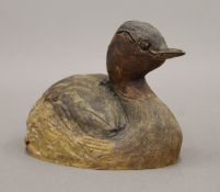 A pottery model Little Grebe aka Dabchick, by Rosemarie Cooke. 13.5 cm long.