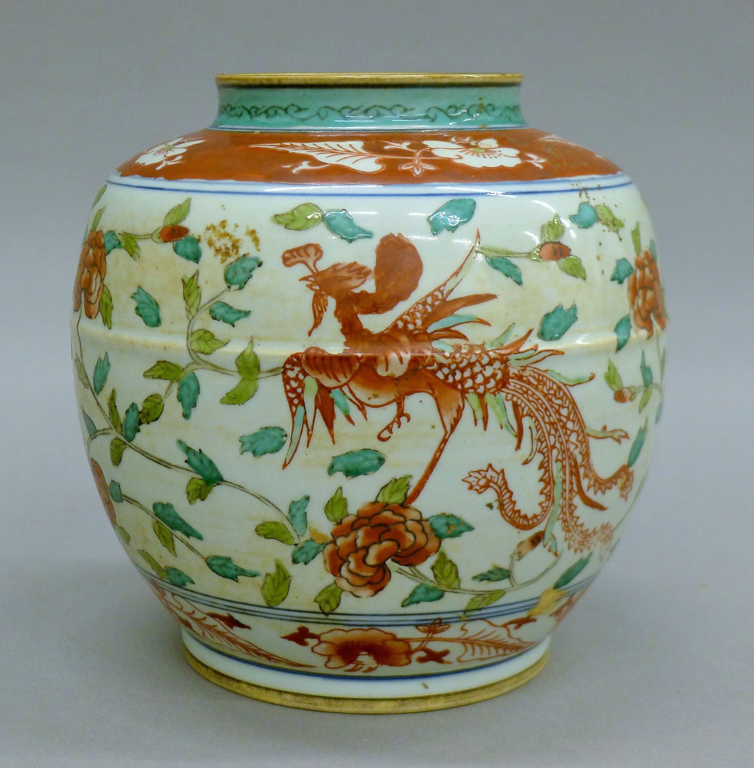 A 20th century Chinese Wucai enamelled ginger jar depicting a pair of phoenixes amongst a floral - Image 2 of 7