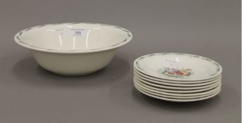 A Susie Cooper dessert service, comprising of a fruit bowl and eight plates. The bowl 23.