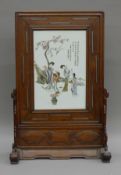 A 19th century Chinese Qianjiang enamelled famille rose screen,