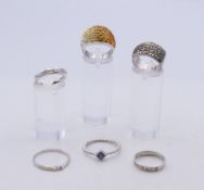 Six various silver rings.