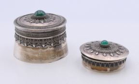 Two small Eastern silver boxes. The largest 3.5 cm high.