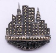 A silver New York marcasite brooch. 3.5 cm wide.