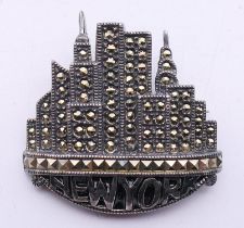 A silver New York marcasite brooch. 3.5 cm wide.