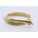 An 18 ct gold plated snake form bracelet.