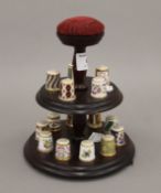A collection of Royal Crown Derby thimbles.