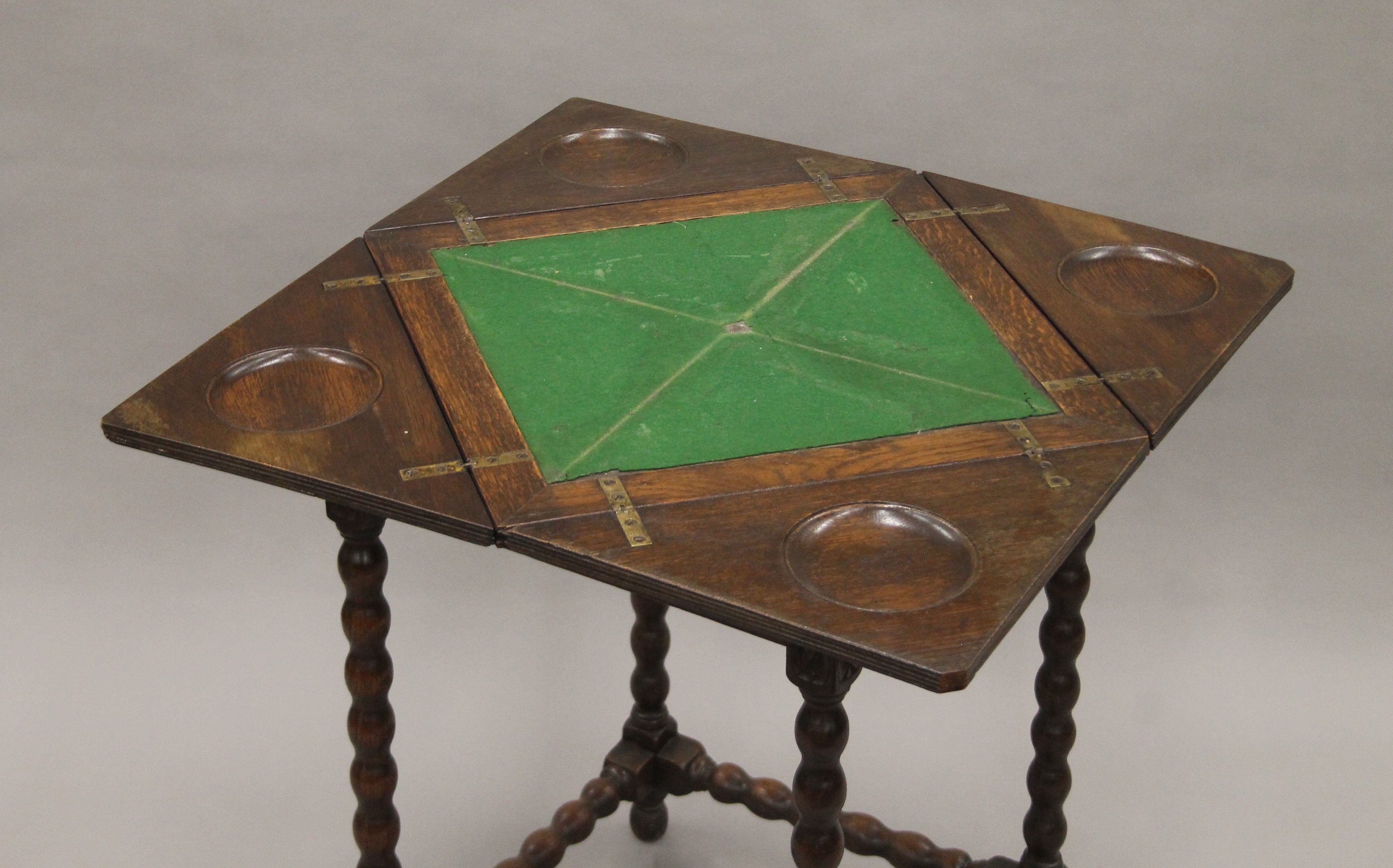A Victorian carved oak envelope card table. 48.5 cm wide. - Image 4 of 4