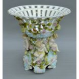 A 19th century Continental figural porcelain tazza. 30 cm high.