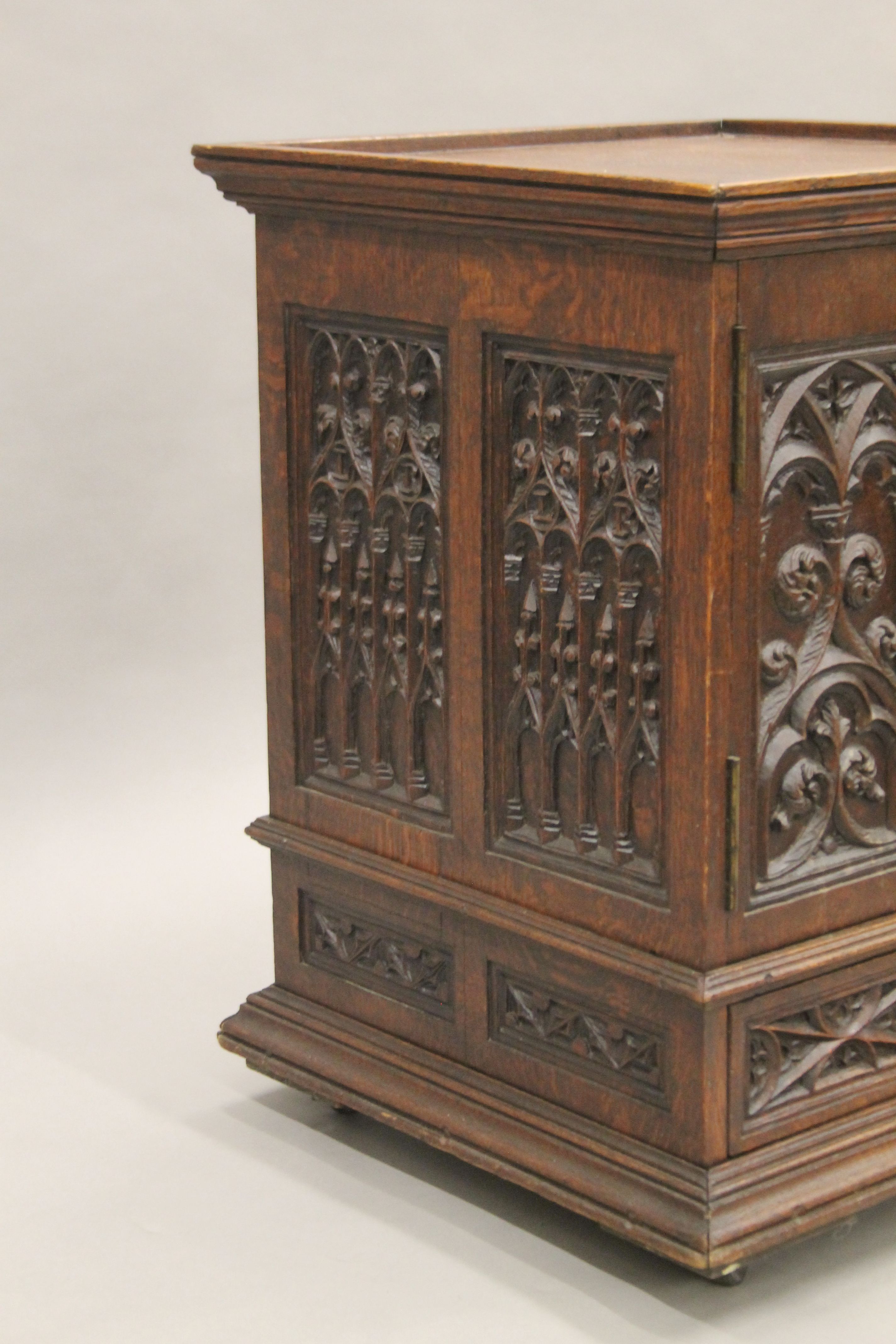 A small Victorian carved oak Gothic Revival cabinet with base drawer. 51.5 cm square. - Image 4 of 7