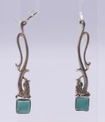 A pair of silver turquoise drop earrings. 5.5 cm high.